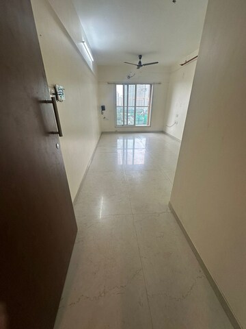 Building Lobby in 2 BHK Apartment at Dosti West County, Balkum Pada – for Rent