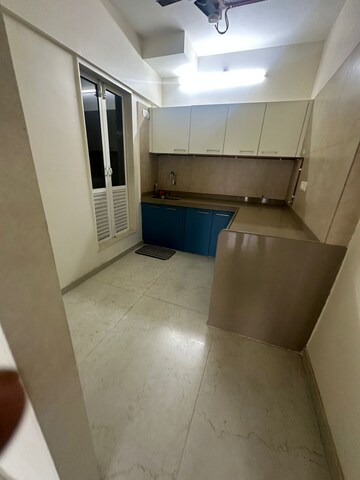 Kitchen in 2 BHK Apartment at Dosti West County, Balkum Pada – for Rent