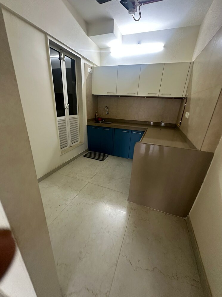 Kitchen, dosti-west-county 2 Bedroom 734 Sq.Ft. Apartment In Balkum Pada Thane 8839337