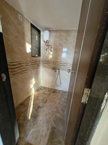 Bathroom in 1 BHK Apartment at Vinay Unique Imperia, Virar West – for Rent