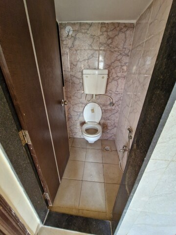 Bathroom in 1 BHK Apartment at Vinay Unique Imperia, Virar West – for Rent