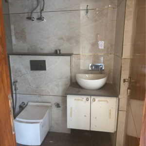 Bathroom in 3 BHK Builder Floor at DLF Central Arcade, Sector 25 – for Sale