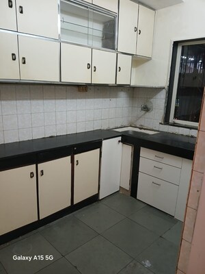 Kitchen in 1 BHK Apartment at Raheja Township, Malad East – for Sale