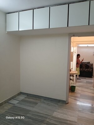 Room in 1 BHK Apartment at Raheja Township, Malad East – for Sale