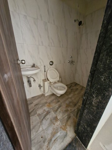 Bathroom in 2 BHK Apartment at Rustomjee Virar Avenue L1 L2 And L4 Wing H, Virar West – for Rent
