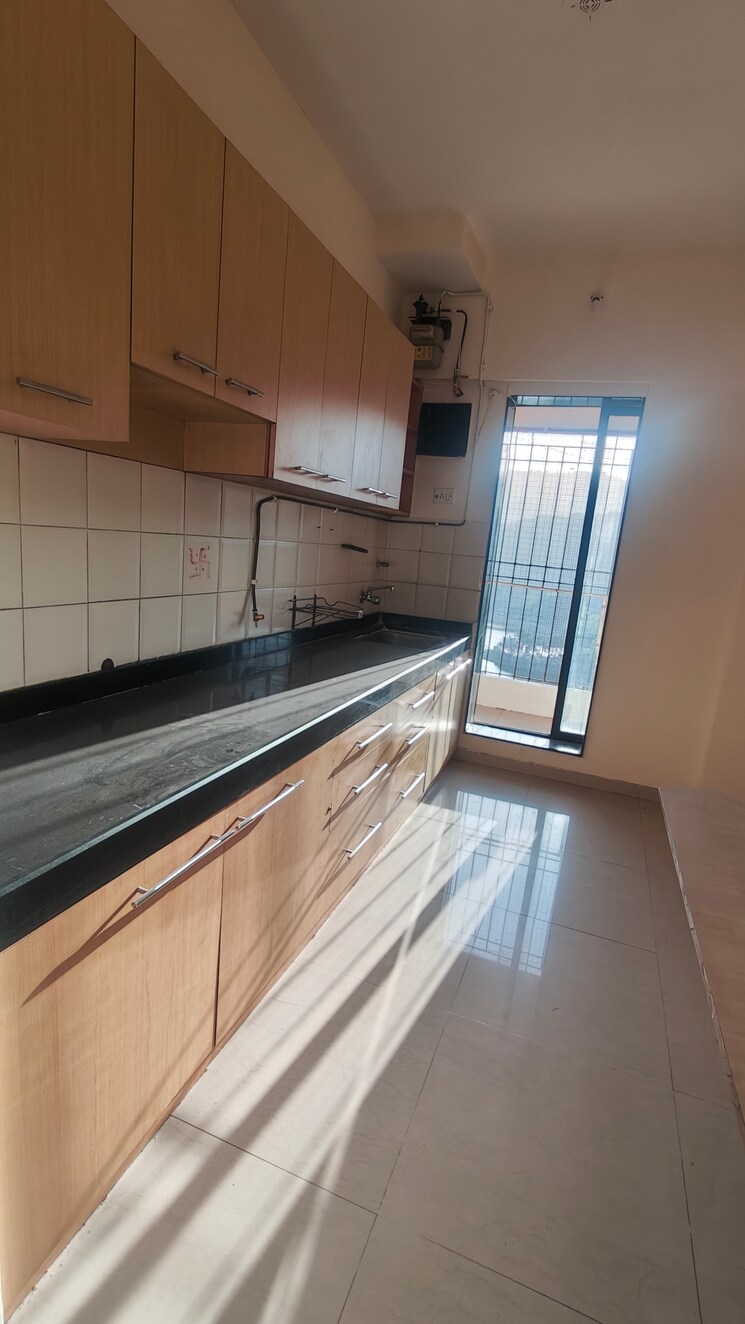 Kitchen, raunak-paradise 2 Bedroom 980 Sq.Ft. Apartment In Kokanipada Thane 8839579