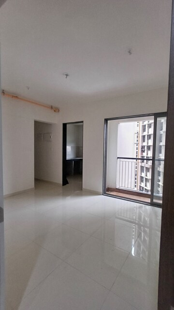 Living Room in 2 BHK Apartment at Runwal Eirene, Balkum Pada – for Rent