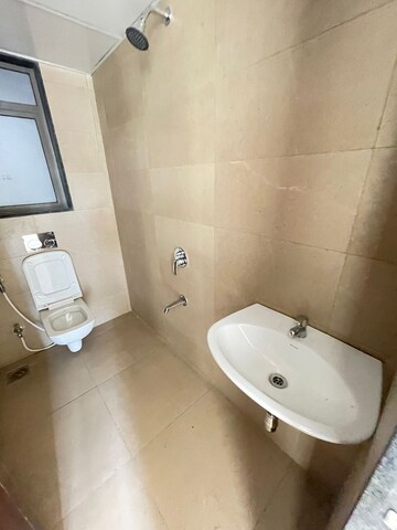 Bathroom in 2 BHK Apartment at Runwal Eirene, Balkum Pada – for Rent