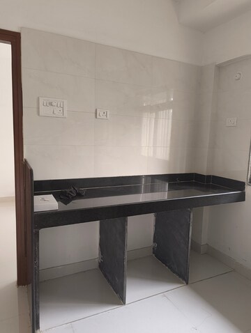 Kitchen in 1 BHK Apartment at BG Shirke Monte Verita, Borivali East – for Rent