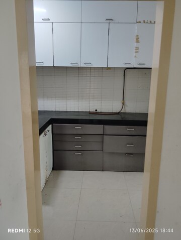 Kitchen in 2 BHK Apartment at DB Parkwoods, Kasarvadavali – for Rent