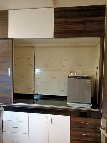 Kitchen in 1 BHK Apartment at Suryamukhi CHS, Goregaon West – for Sale