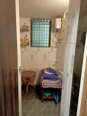 Living Room in 1 BHK Apartment at Suryamukhi CHS, Goregaon West – for Sale