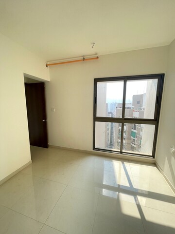 Living Room in 2 BHK Apartment at Runwal Eirene, Balkum Pada – for Rent