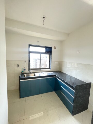 Kitchen in 2 BHK Apartment at Runwal Eirene, Balkum Pada – for Rent