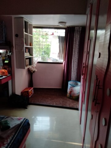 Living Room in 1 BHK Apartment at Anita CHS, Borivali West – for Rent