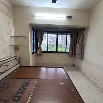 Bedroom in 1 BHK Apartment at Pawapuri CHS, Ashok Nagar – for Rent