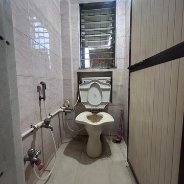 Bathroom in 1 BHK Apartment at Pawapuri CHS, Ashok Nagar – for Rent