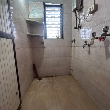 Bathroom in 1 BHK Apartment at Pawapuri CHS, Ashok Nagar – for Rent
