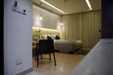 Living Room in Studio Apartment at AIPL Joy Square, Sector 63a – for Rent