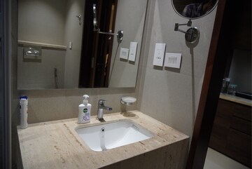 Bathroom in Studio Apartment at AIPL Joy Square, Sector 63a – for Rent