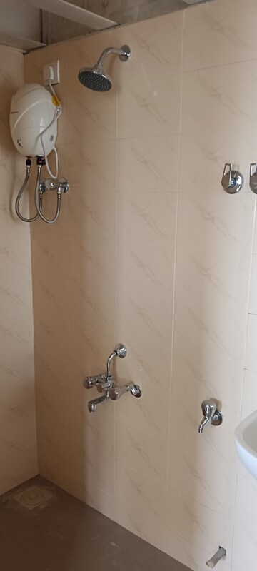 Bathroom in 1 BHK Apartment at Bageshri CHS, Goregaon East – for Rent