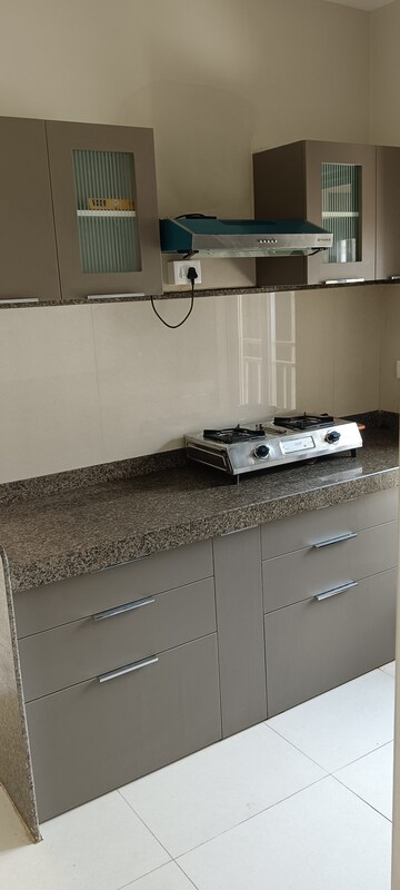 Kitchen in 2 BHK Apartment at Riddhi Gardens CHS, Malad East – for Rent