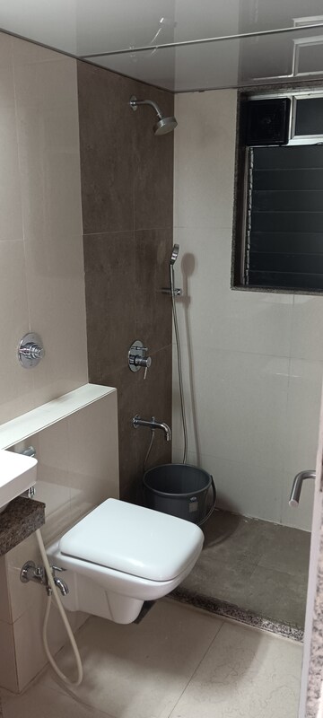 Bathroom in 2 BHK Apartment at Riddhi Gardens CHS, Malad East – for Rent