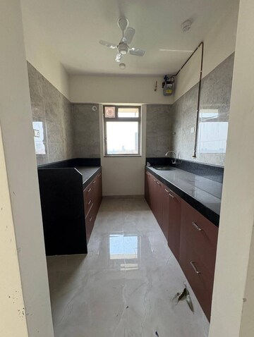 Kitchen in 2 BHK Apartment at Sheth Irene, Malad West – for Rent