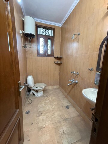 Bathroom in 2 BHK Builder Floor at Kalkaji – for Rent