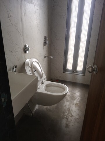 Bathroom in 2 BHK Apartment at Pratham ARC Aura, Andheri West – for Sale