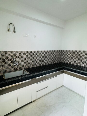 Kitchen in 2 BHK Apartment at Galaxy Vega, Tech Zone 4 Greater Noida – for Sale