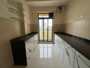 Kitchen in 2 BHK Apartment at Mahavir Kalpavruksha, Ghodbunder Road – for Rent