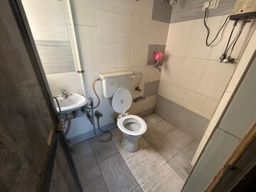 Bathroom in 2 BHK Apartment at Swastik Residency 1, Ghodbunder Road – for Rent