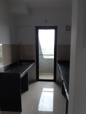 Kitchen in 1 BHK Apartment at Lodha Palava Eviva K To T Urbano A C F and I To T, Dombivli East – for Rent