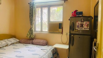 Living Room in 2 BHK Apartment at Rosario CHS, Borivali West – for Rent