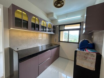 Kitchen in 3 BHK Apartment at KM Horizon Exotica, Haware City – for Rent