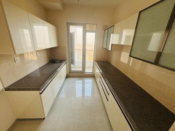 Kitchen in 2 BHK Apartment at Piramal Vaikunth, Balkum Pada – for Rent