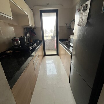 Kitchen in 1.5 BHK Apartment at Lodha Palava Downtown Dombivli East, Taloja Bypass Road – for Rent