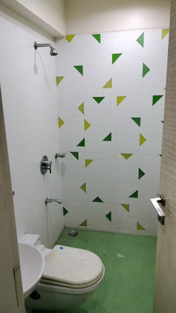 Bathroom in 2 BHK Apartment at Swaraj Queensbay, Kopar Khairane – for Rent