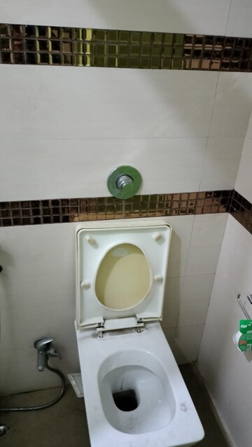 Bathroom in 2 BHK Apartment at Swaraj Queensbay, Kopar Khairane – for Rent