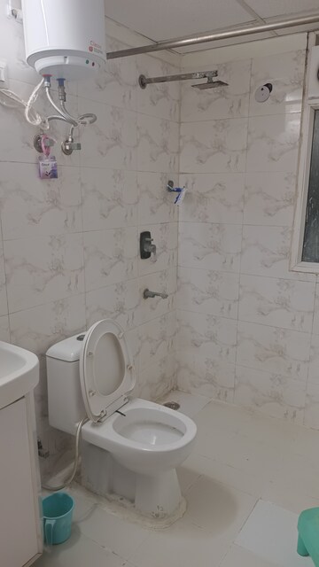 Bathroom in 2 BHK Apartment at Amrapali Princely Estate, Sector 76 – for Rent
