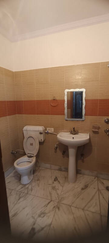 Bathroom in 4 BHK Builder Floor at Virender Nagar – for Rent