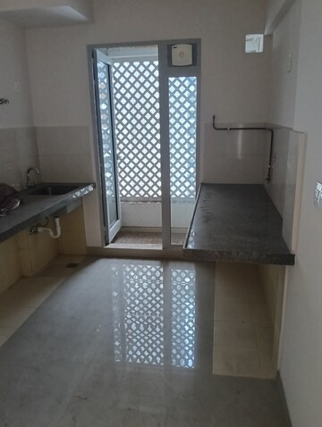 Kitchen in 1.5 BHK Apartment at Piramal Vaikunth, Balkum Pada – for Rent
