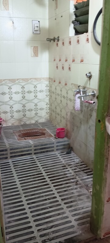 Bathroom in 2 BHK Apartment at Mahal – for Sale