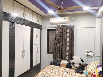 Bedroom in 2 BHK Apartment at Harjas CHS, Ic Colony – for Rent