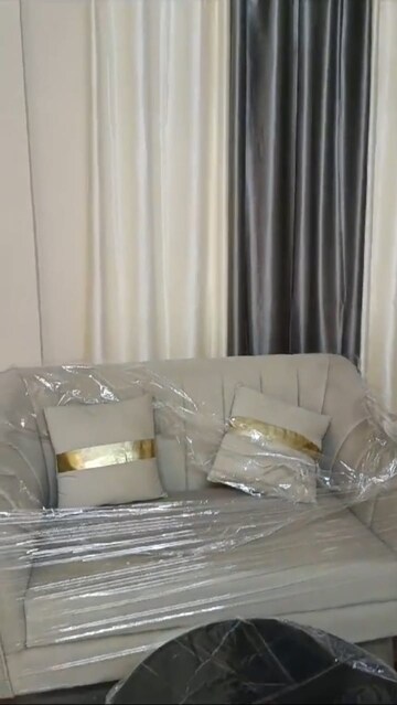 Living Room in 2 BHK Apartment at Wave Executive Floors, Wave City – for Rent