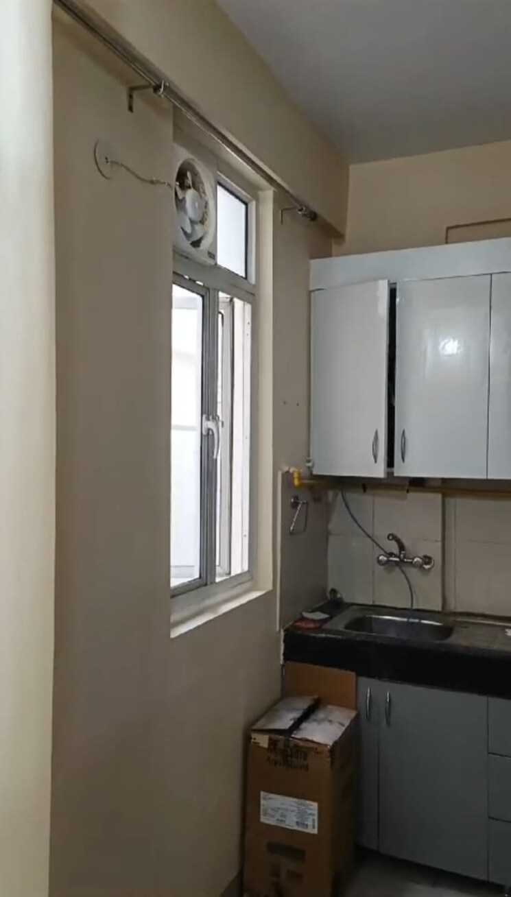 Kitchen, wave-executive-floors 2 Bedroom 900 Sq.Ft. Apartment In Wave City Ghaziabad 8841025