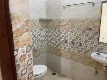Bathroom in 2 BHK Builder Floor at Dhakoli – for Sale
