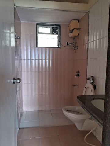 Bathroom in 2 BHK Apartment at Dosti Acres Aster, Wadala East – for Rent