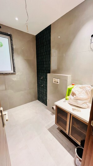 Bathroom in 4 BHK Builder Floor at Ansal API Esencia, Sector 67 – for Sale